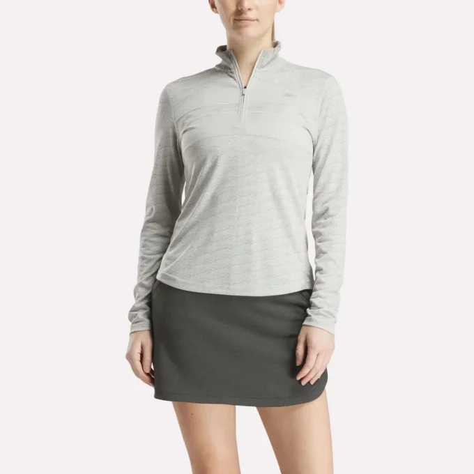 Långärmad golfpullover för damer i Engineered Vector Jacquard med 1/4 dragkedja Långärmad golfpullover för damer i Engineered Vector Jacquard med 1/4 dragkedja