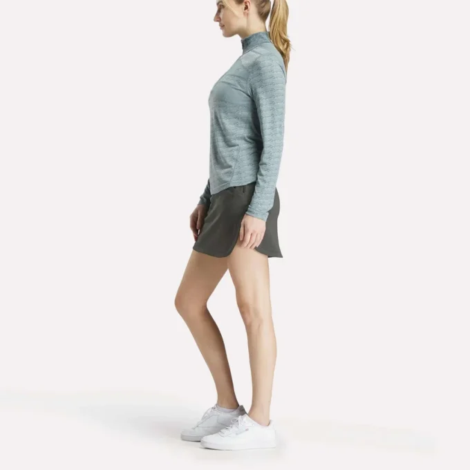 Långärmad golfpullover för damer i Engineered Vector Jacquard med 1/4 dragkedja Långärmad golfpullover för damer i Engineered Vector Jacquard med 1/4 dragkedja