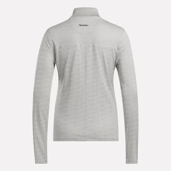 Långärmad golfpullover för damer i Engineered Vector Jacquard med 1/4 dragkedja Långärmad golfpullover för damer i Engineered Vector Jacquard med 1/4 dragkedja