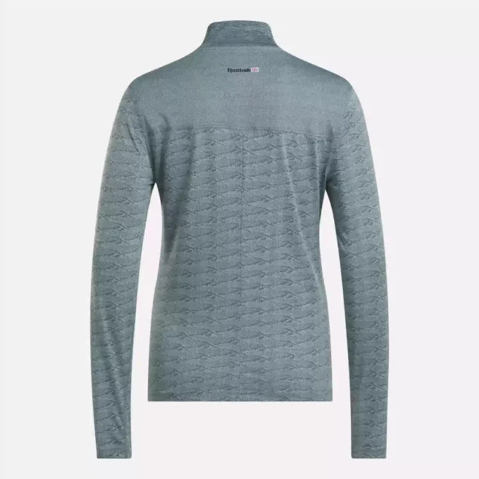 Långärmad golfpullover för damer i Engineered Vector Jacquard med 1/4 dragkedja Långärmad golfpullover för damer i Engineered Vector Jacquard med 1/4 dragkedja