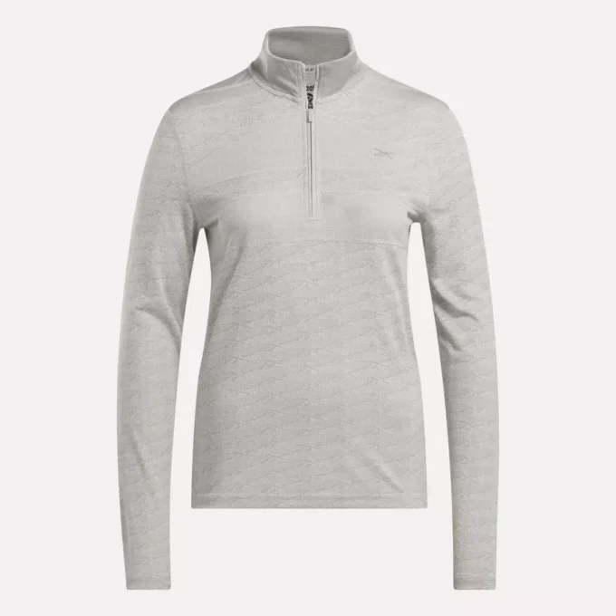 Långärmad golfpullover för damer i Engineered Vector Jacquard med 1/4 dragkedja Långärmad golfpullover för damer i Engineered Vector Jacquard med 1/4 dragkedja