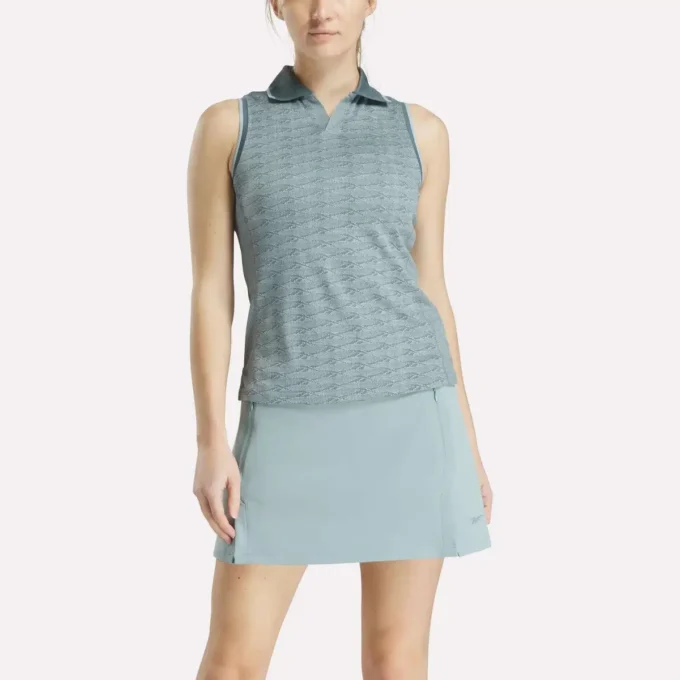 Ärmlös golfpikétröja för damer i ton-i-ton-mönster med jacquard Ärmlös golfpikétröja för damer i ton-i-ton-mönster med jacquard