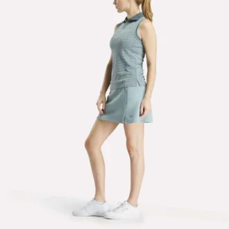 Ärmlös golfpikétröja för damer i ton-i-ton-mönster med jacquard