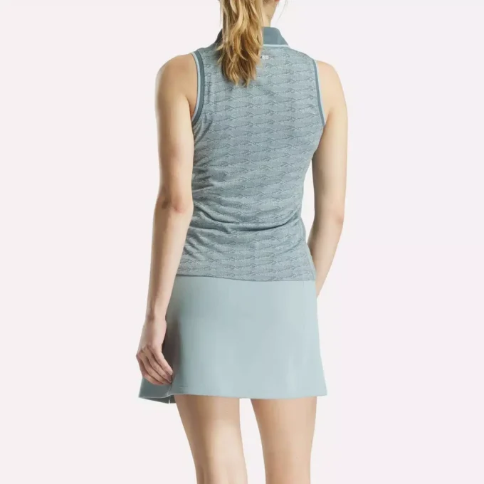 Ärmlös golfpikétröja för damer i ton-i-ton-mönster med jacquard Ärmlös golfpikétröja för damer i ton-i-ton-mönster med jacquard