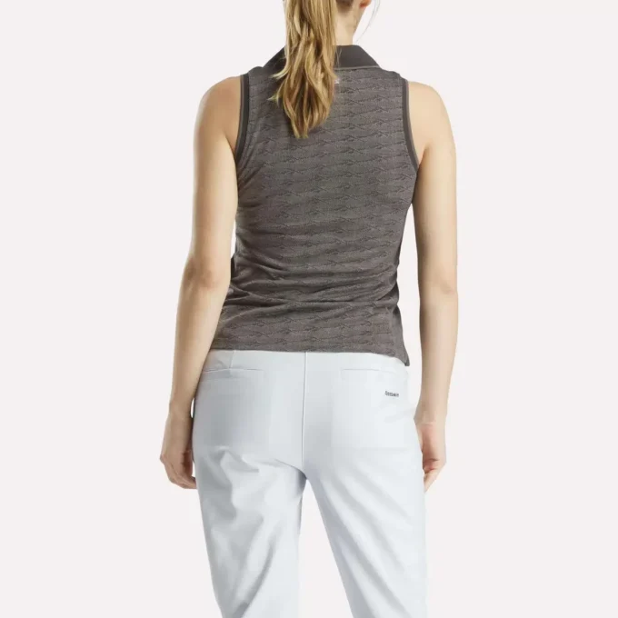 Ärmlös golfpikétröja för damer i ton-i-ton-mönster med jacquard Ärmlös golfpikétröja för damer i ton-i-ton-mönster med jacquard